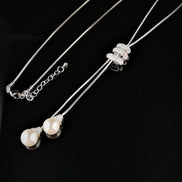 Faux Pearl Drop Necklace with statement Diamante Catch 12