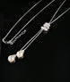 Faux Pearl Drop Necklace with statement Diamante Catch 12