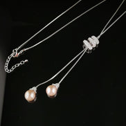Faux Pearl Drop Necklace with statement Diamante Catch 12