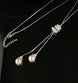 Faux Pearl Drop Necklace with statement Diamante Catch 12