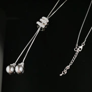 Faux Pearl Drop Necklace with statement Diamante Catch 12
