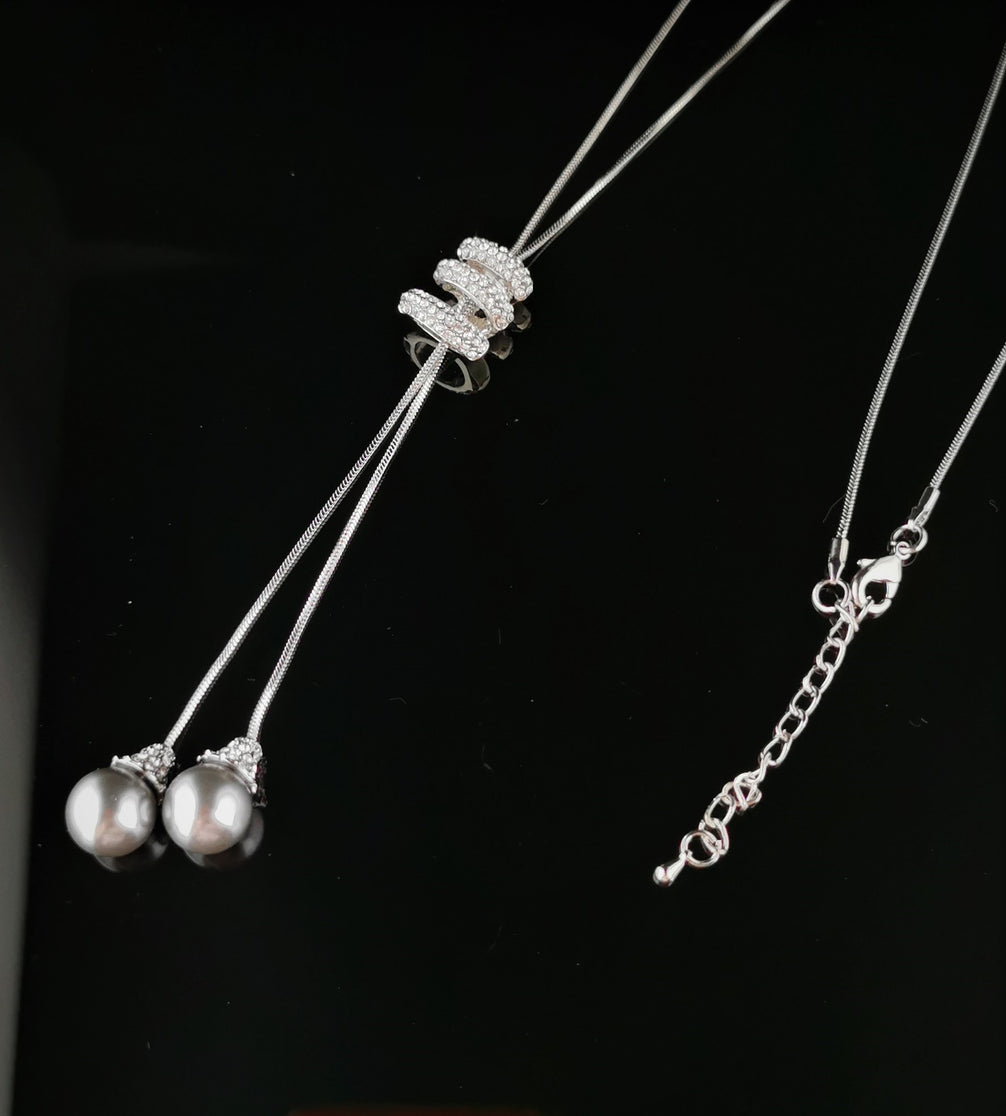Faux Pearl Drop Necklace with statement Diamante Catch 12