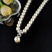 Faux Pearl Necklace with statement Diamante Pendant Clasp 16