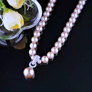Faux Pearl Necklace with statement Diamante Pendant Clasp 16