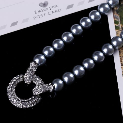 Faux Pearl Necklace with Statement Diamante Love Ring 9
