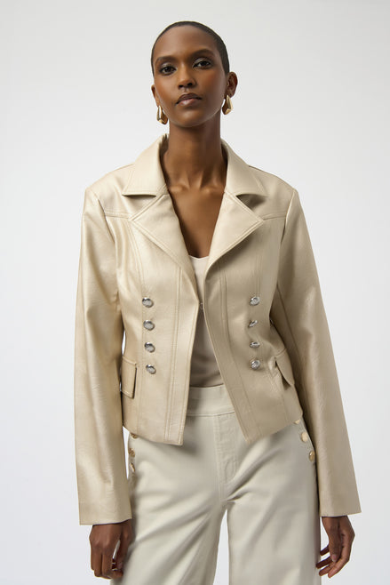 Woman wearing a beige jacket with a plain background