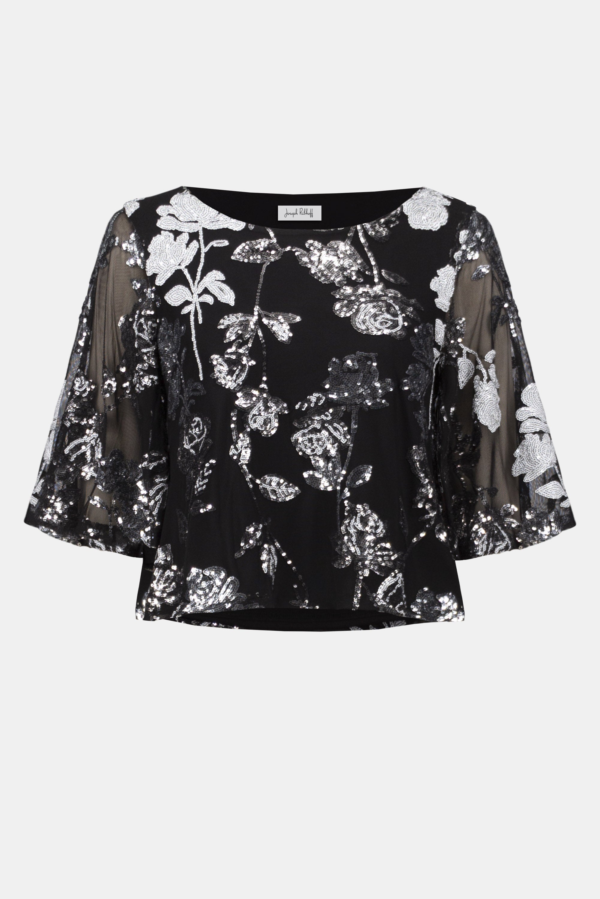 Black floral blouse with sheer sleeves on a white background