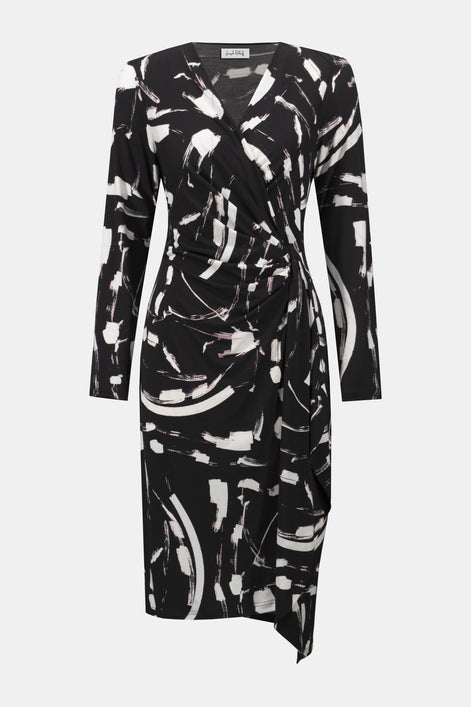 Black and white abstract patterned dress on a white background