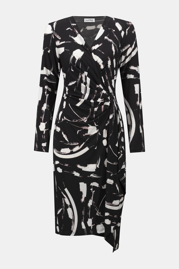 Black and white abstract patterned dress on a white background