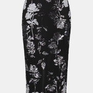Black pencil skirt with floral sequin pattern on a white background