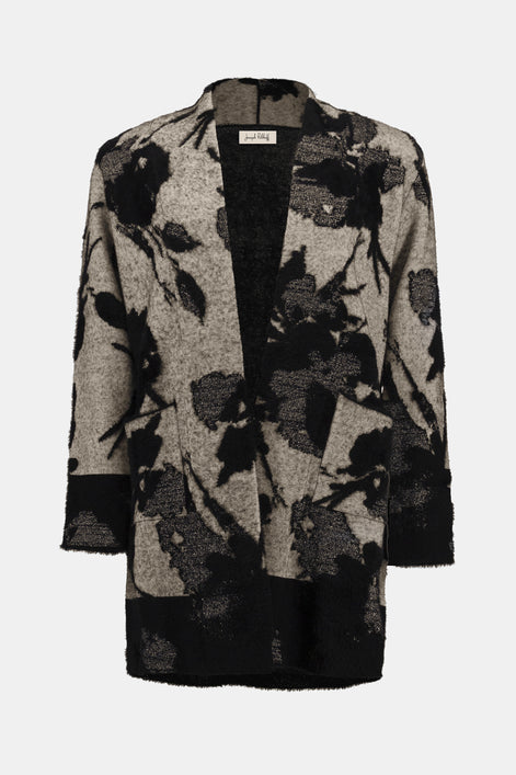 Floral patterned coat on a white background