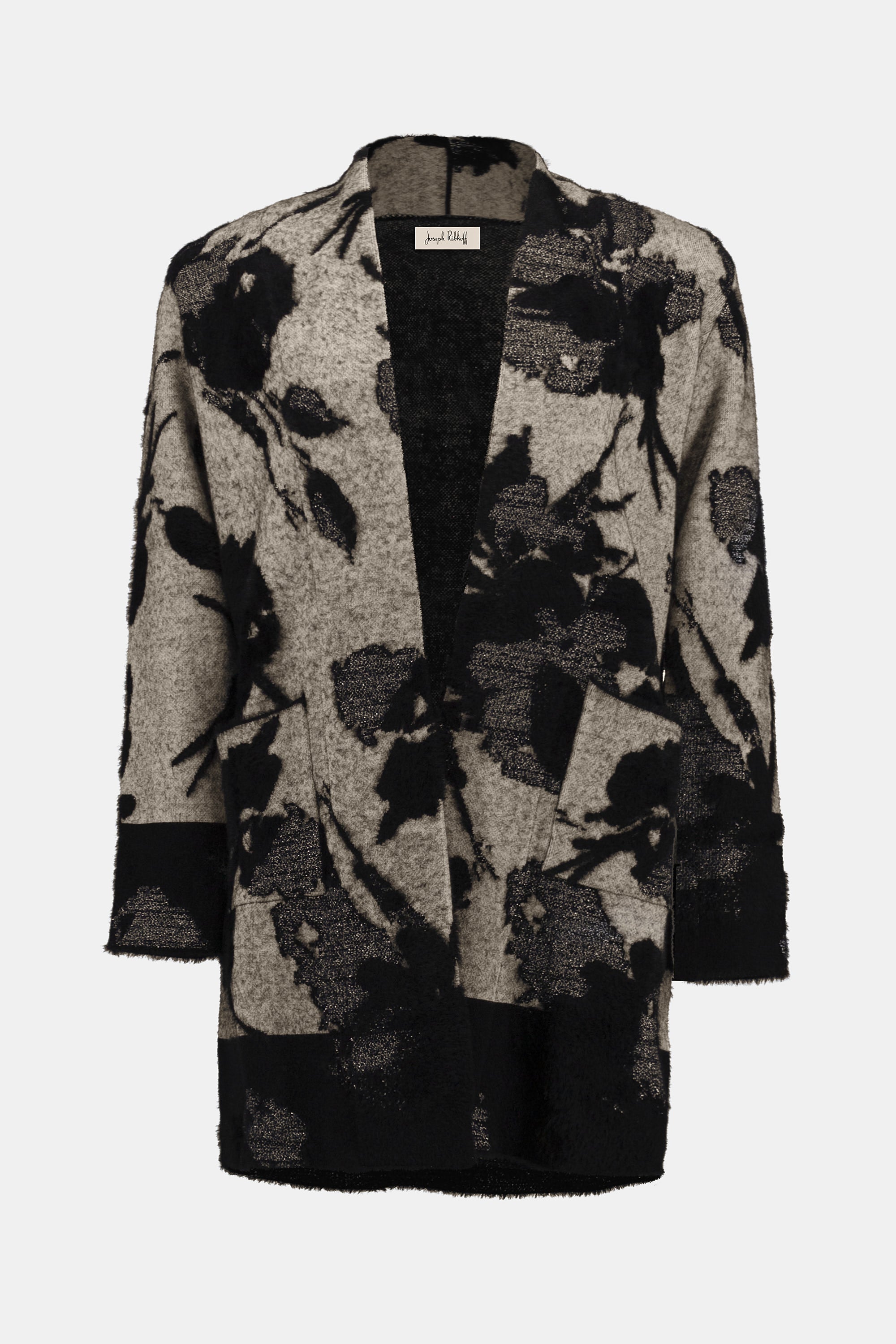 Floral patterned coat on a white background